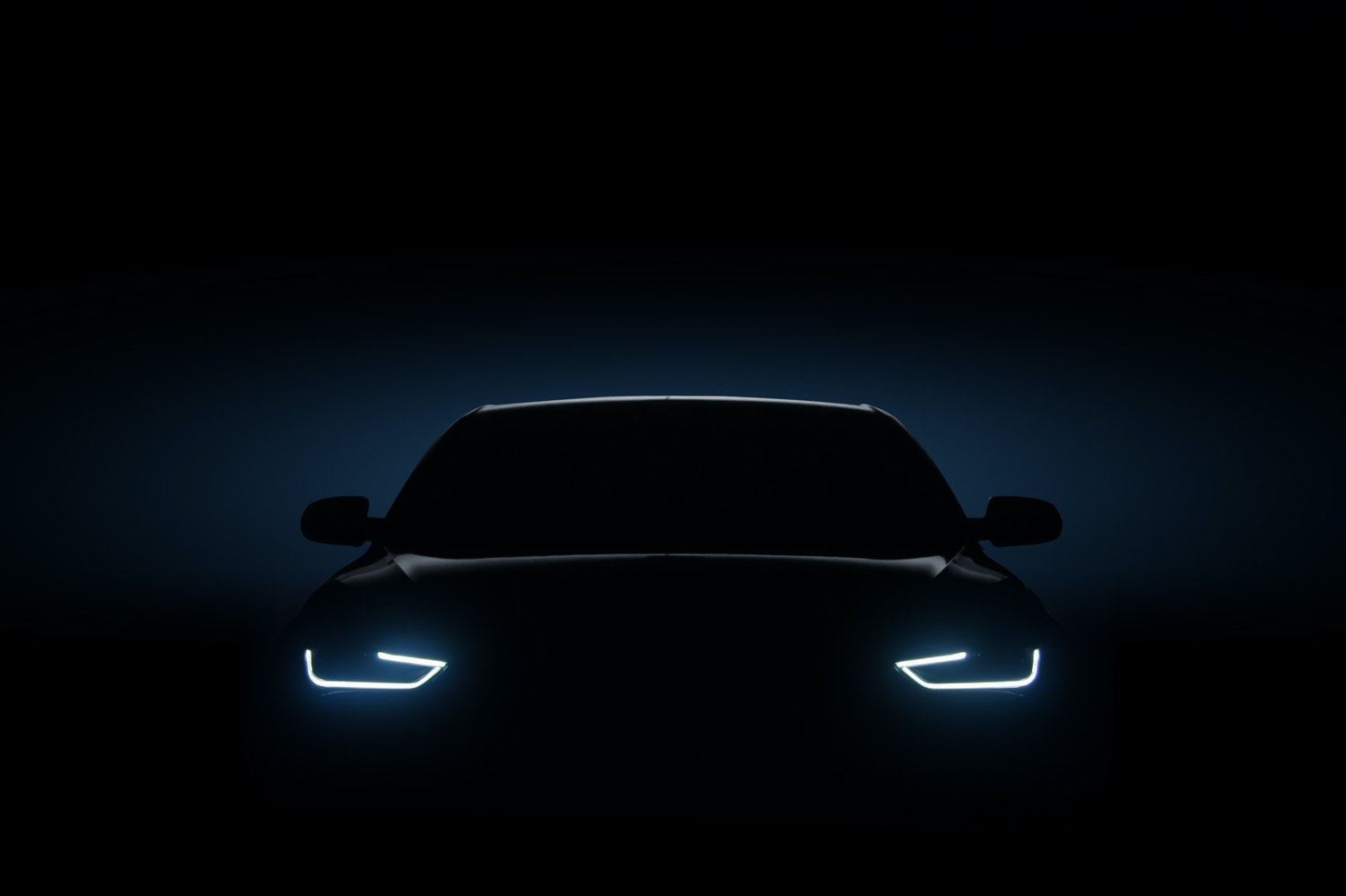 Car in the dark with headlights on