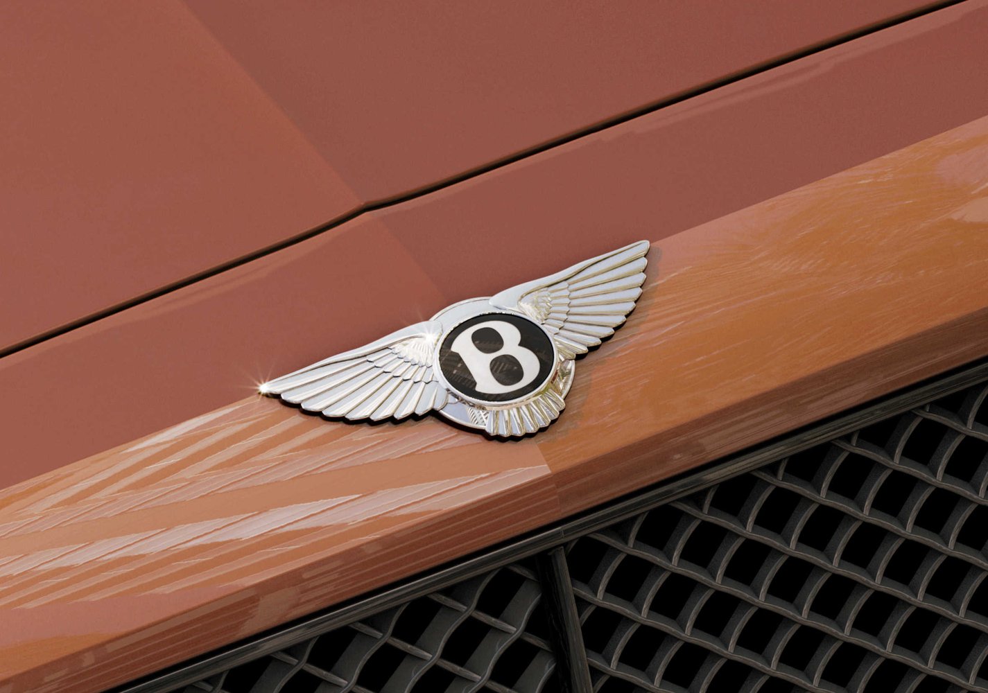 Bentley logo on front of Bentley car