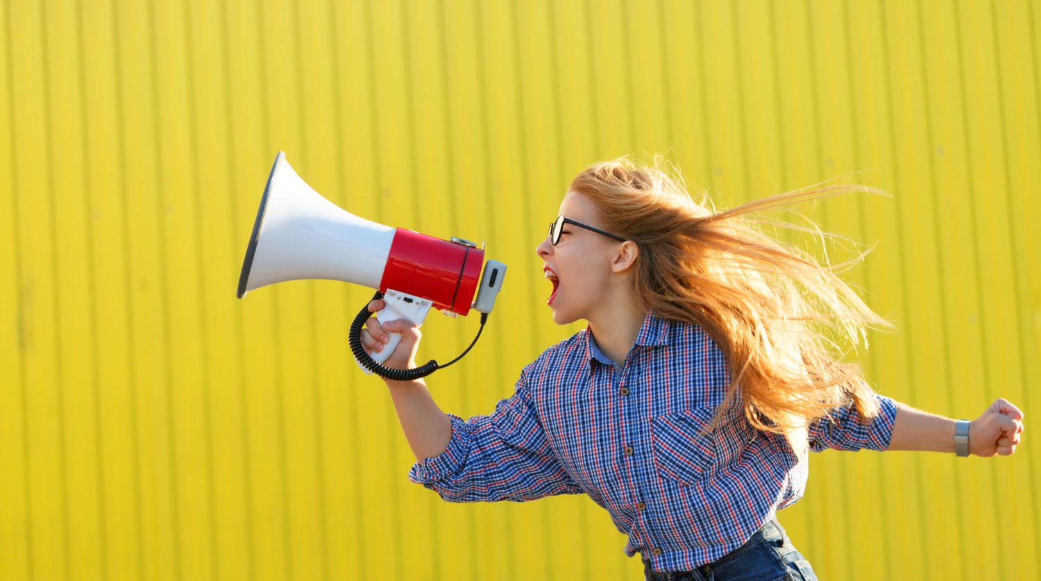 Woman using a megaphone