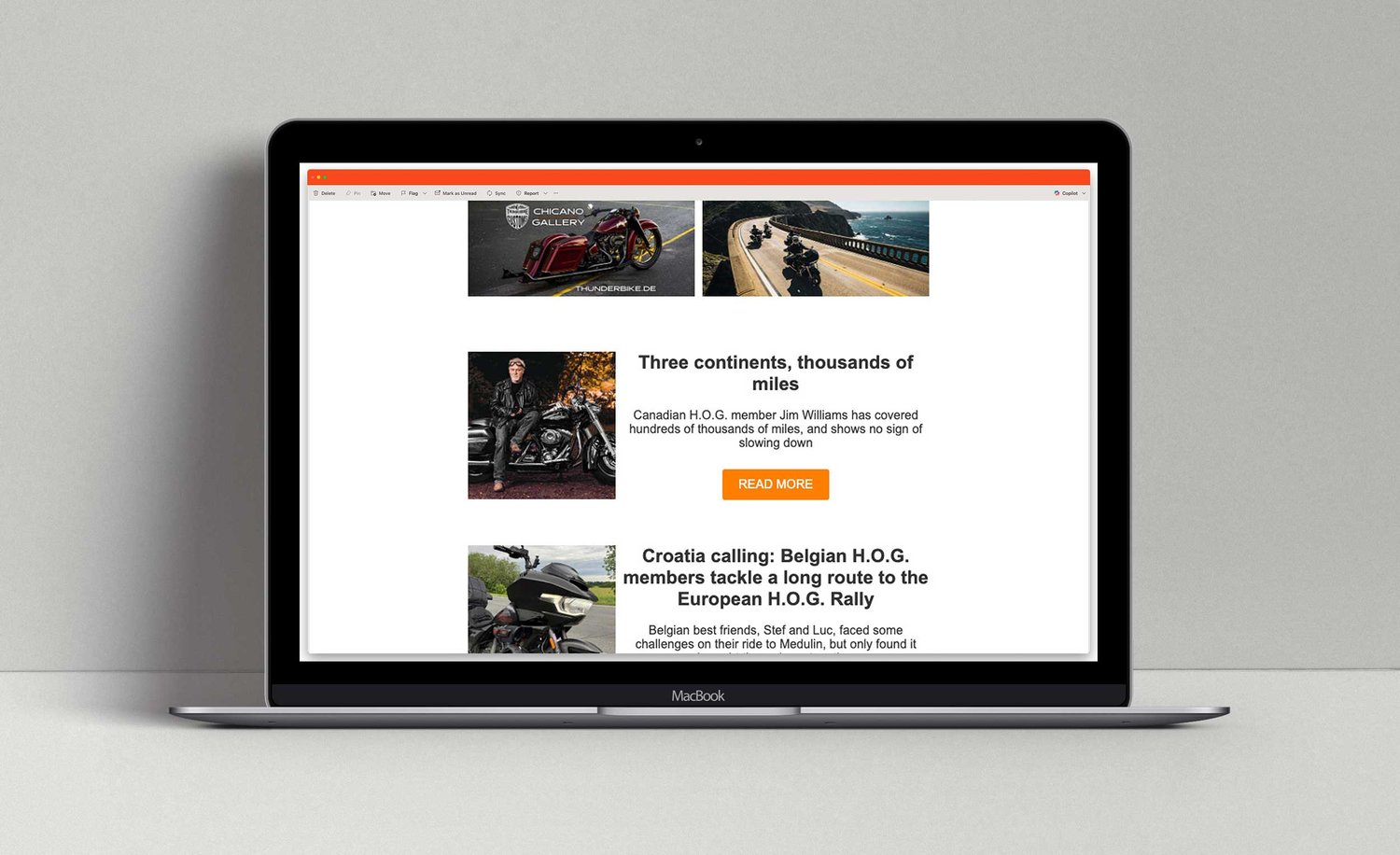 Viewing a Harley Owners Group email on a laptop