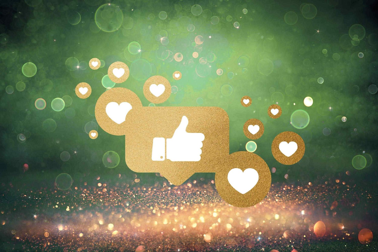 Gold social media icons floating over a glittery surface