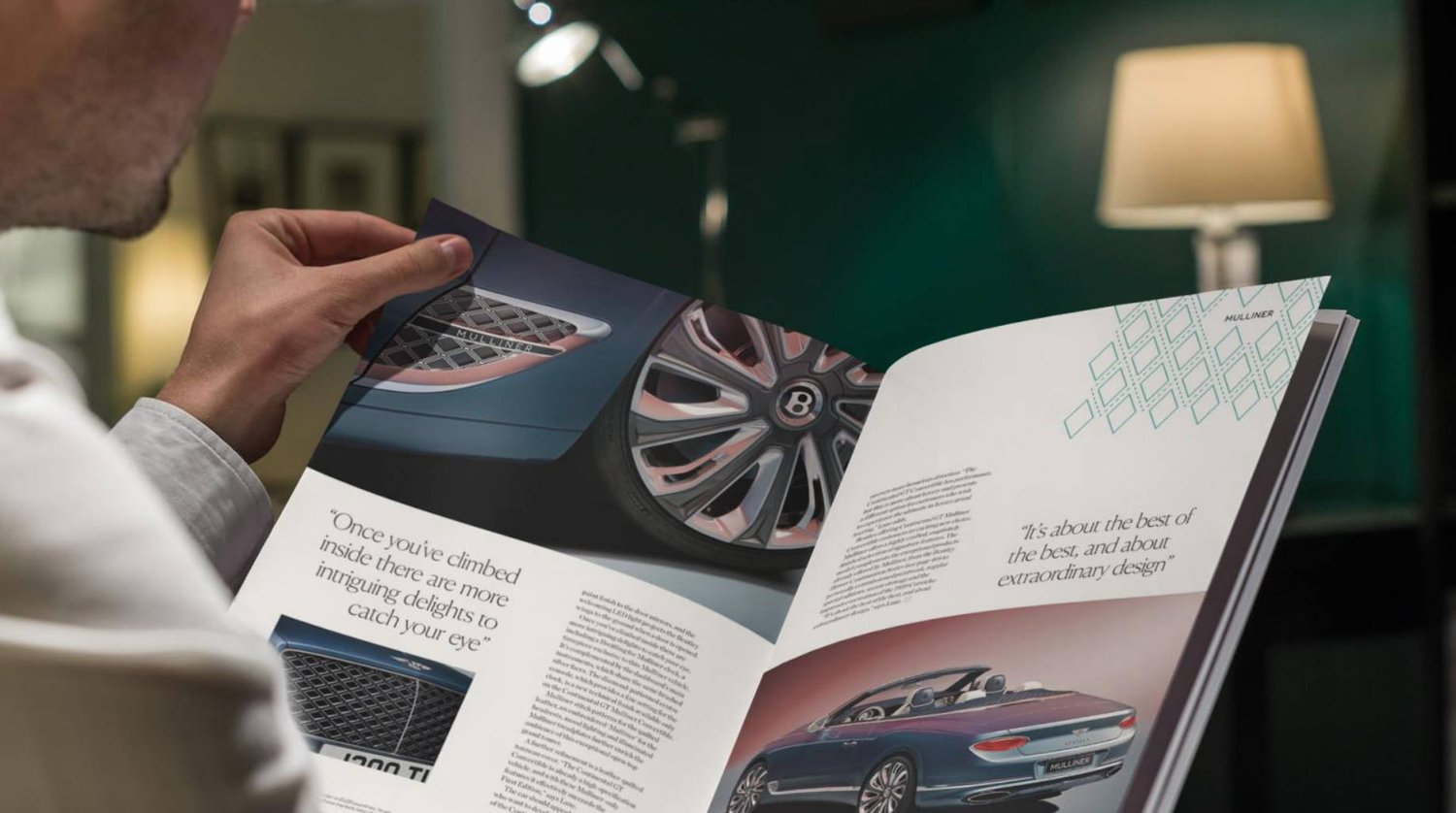 Man reading automotive magazine