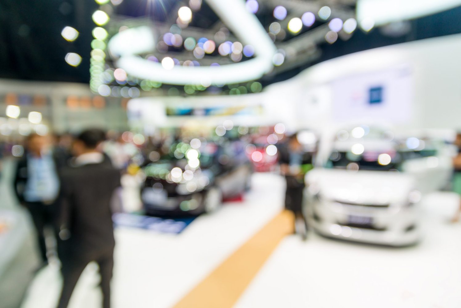 Blurry image of automotive trade show