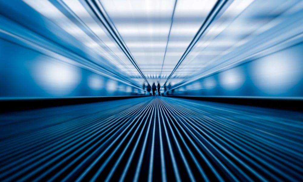 Long escalator walkway at airport