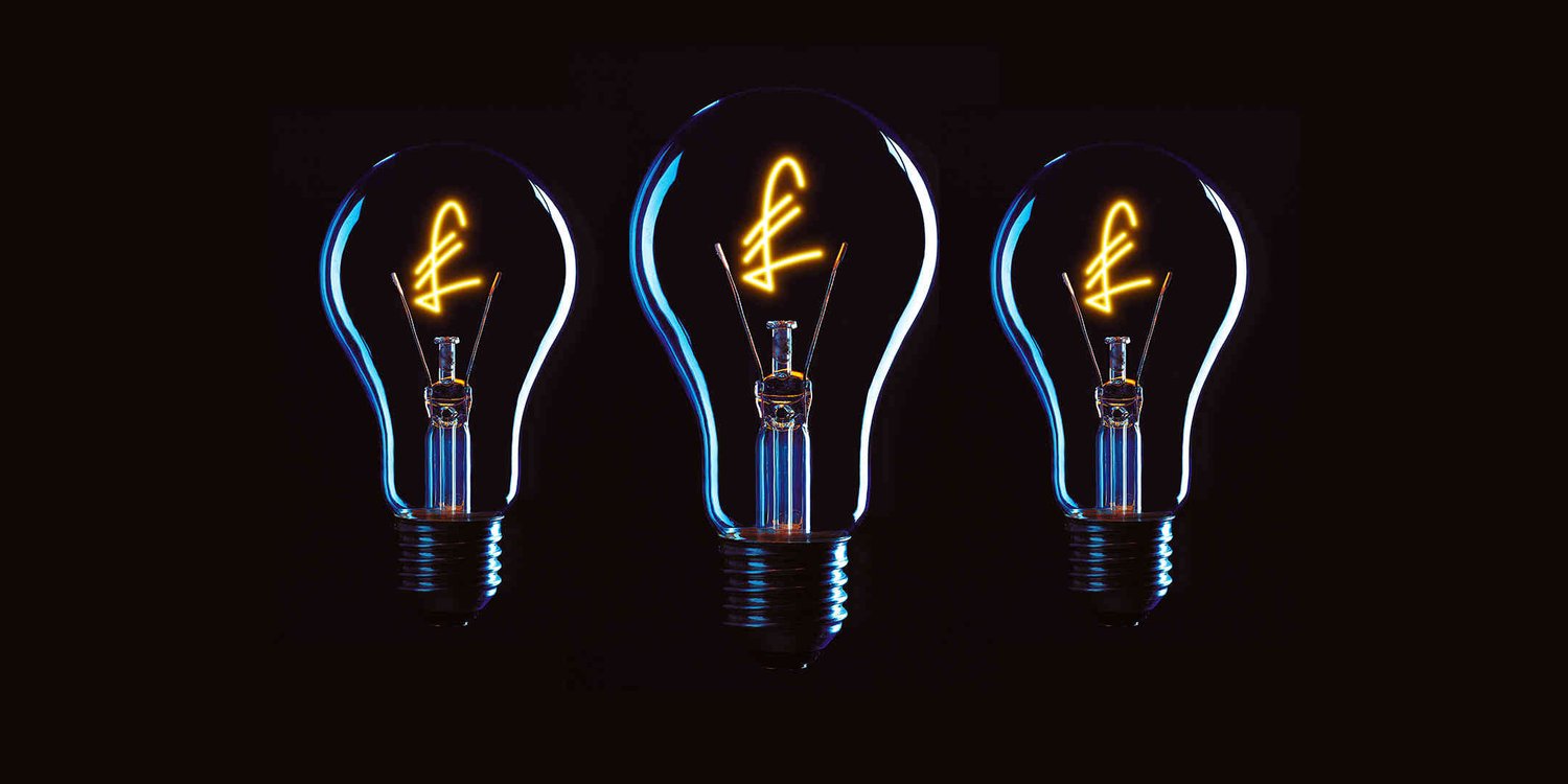 Three lightbulbs with pound signs as the filament on a black background