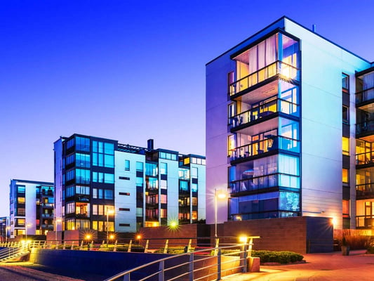 Vibrantly lit university halls at night