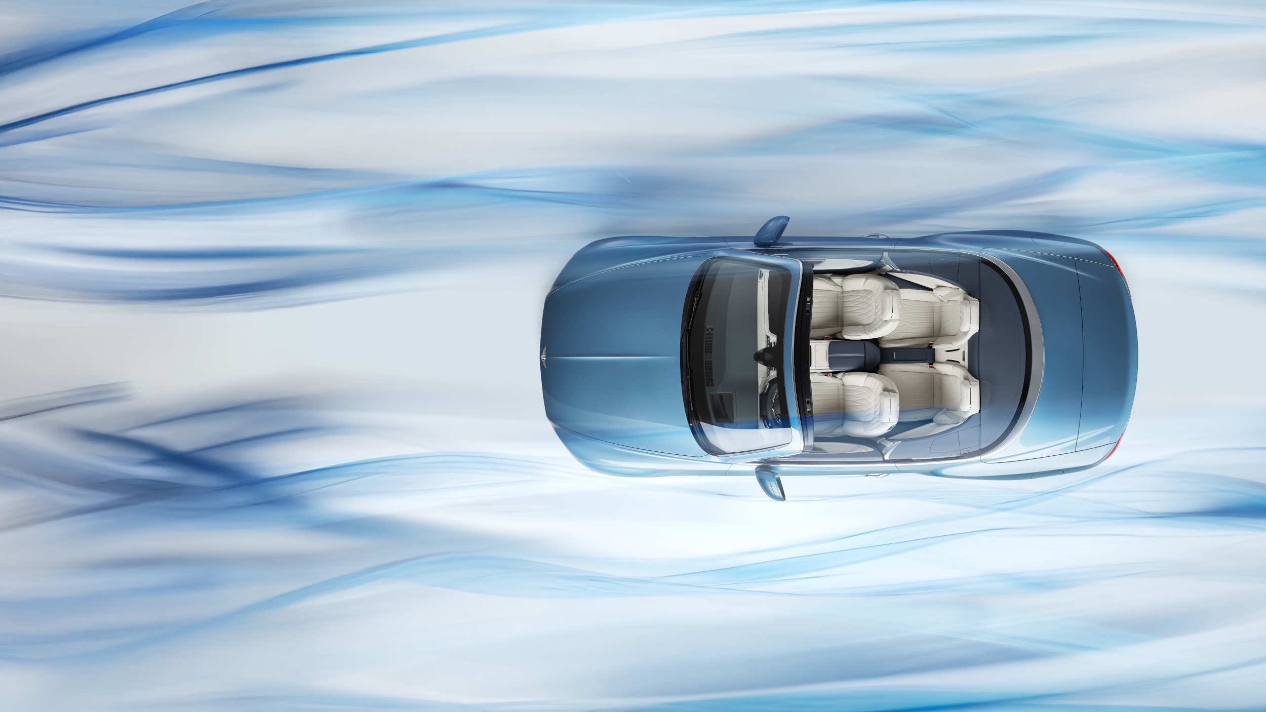 Looking down on a blue Bentley convertible